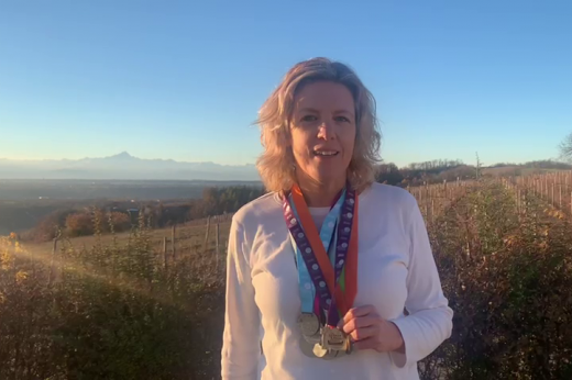 Laura Parker pictured in the hills of Italy with her medals