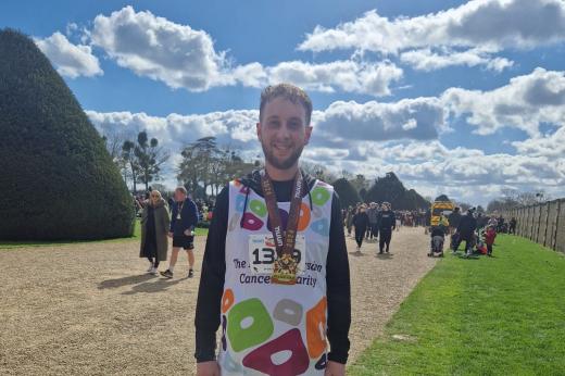 RMCC runner smiling after Palace Half Marathon 2024