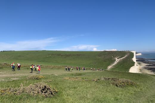 Supporters on cliffs at the South Downs Trek 2024