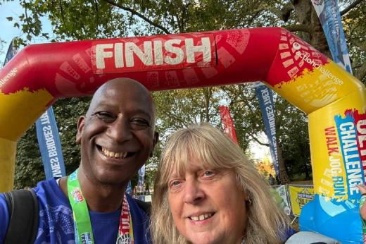 Two walkers smiling during Thames Path 2024