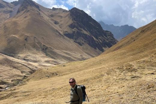 Hiker in front of mountains