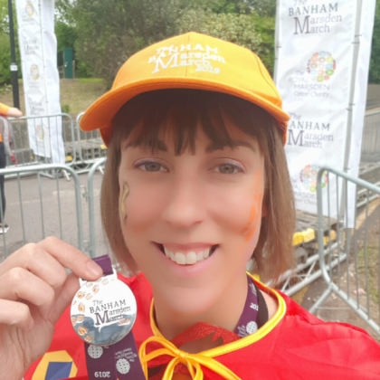 Laura with her medal