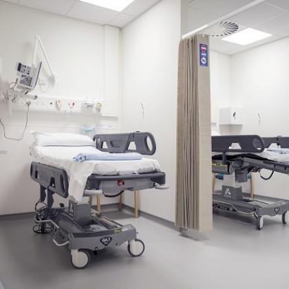 A medical room at The Royal Marsden with two hospital beds