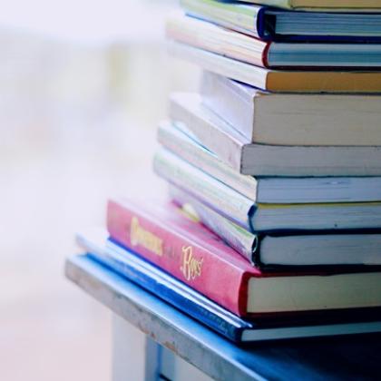 A pile of books on a table