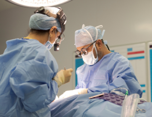 Dr Vinidh Paleri in surgery at The Royal Marsden