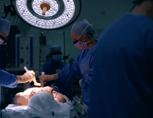 Surgeons operating on a man