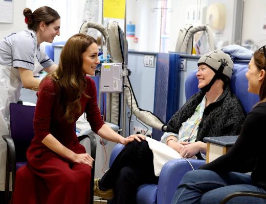 Her Royal Highness, The Princess of Wales speaking with a patient wearing a cold cap in the medical day unit at The Royal Marsden, Chelsea. 