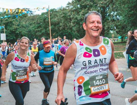 An image of two Team Marsden runners smiling at the camera